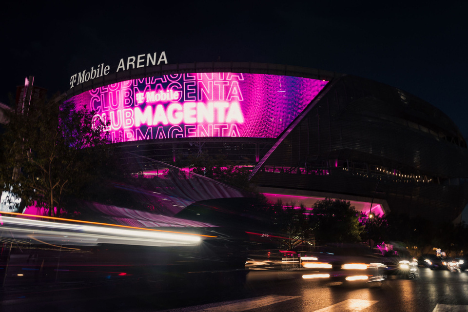Exterior photo of T-Mobile arena with T-Mobile Club Magenta branding on the screen