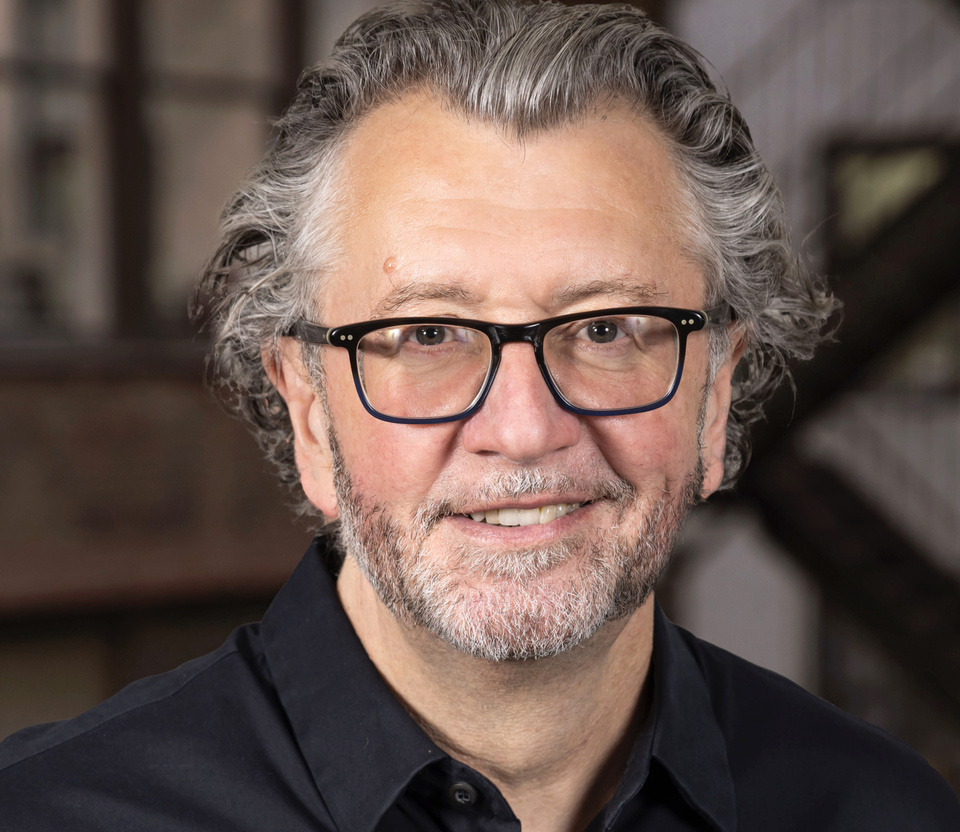Image of Mark Shearon's headshot with the Forbes logo below on a plum gradient background
