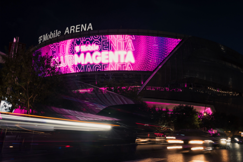 Exterior photo of T-Mobile arena with T-Mobile Club Magenta branding on the screen