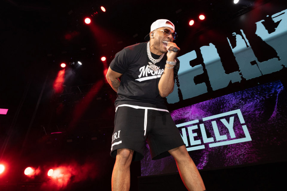 Image of musician Nelly performing on stage