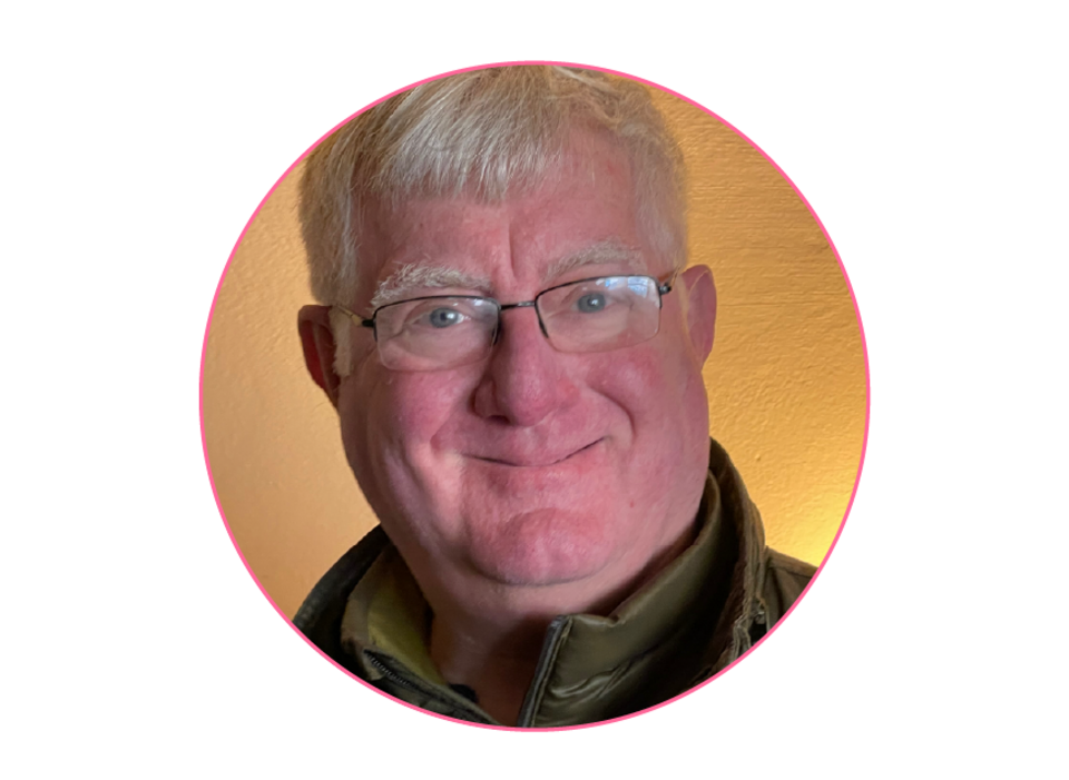 Photo of man's headshot in pink circle